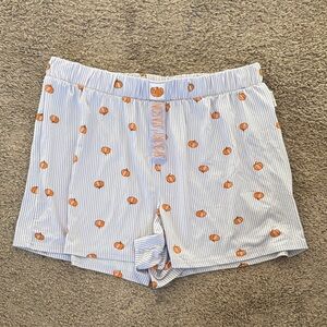 Blue and White Striped Shorts with Orange pumpkin Print